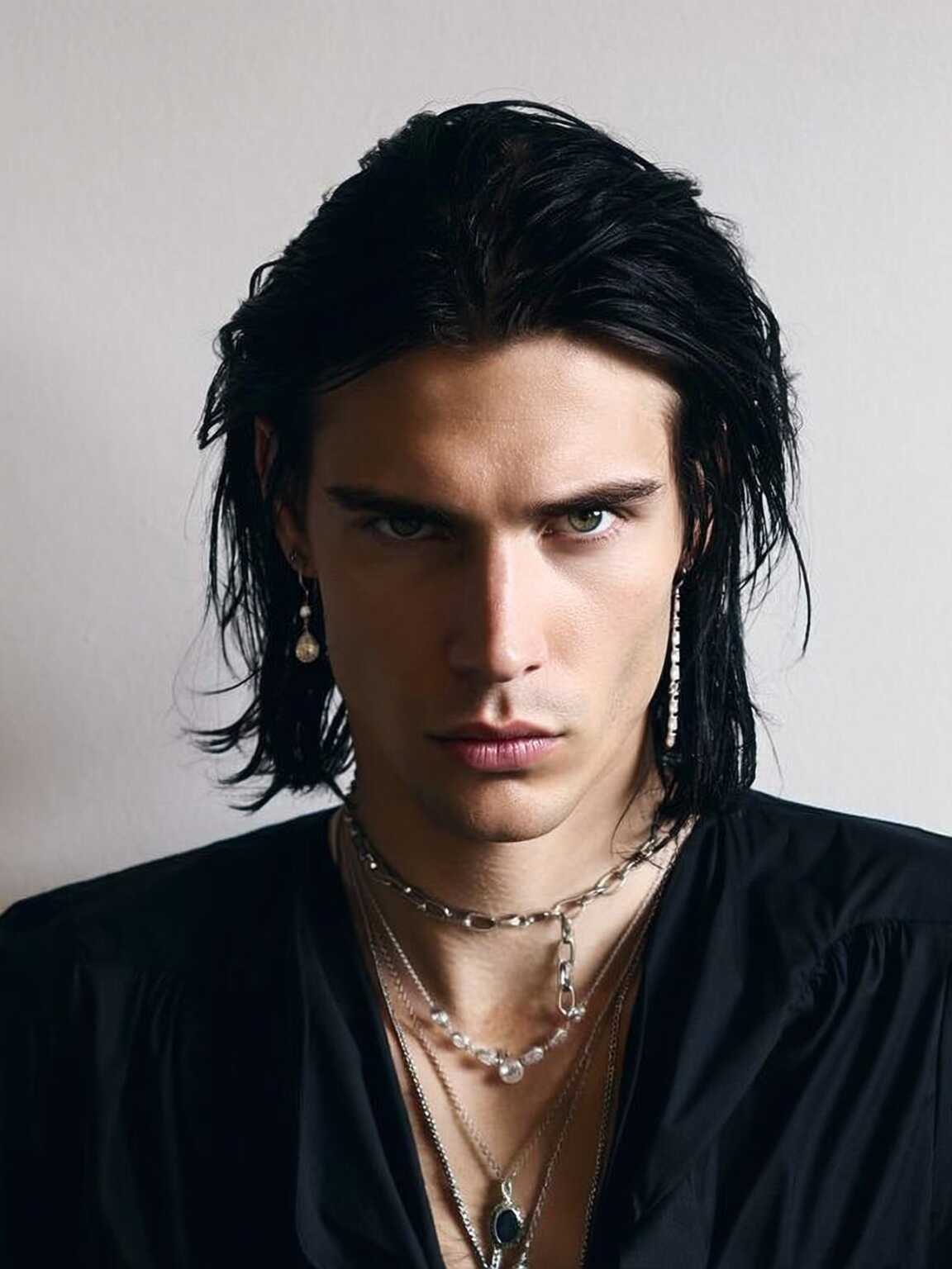 wide-angle walking shot of Damon Cael in layered avant-pop couture, rising pop artist Damon Cael.